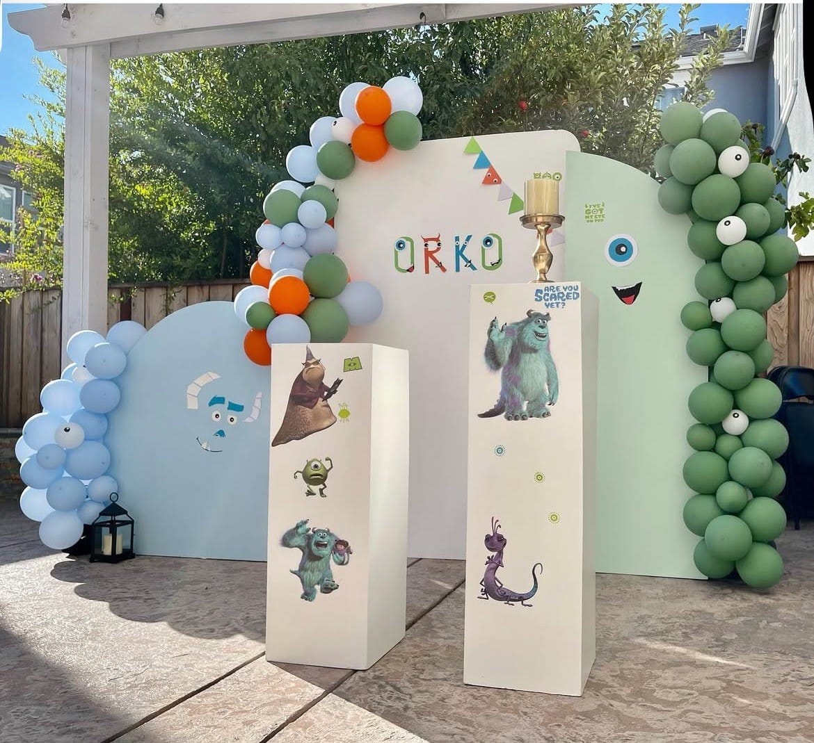 Party backdrop of Orko with balloons and creative shapes by Mellow Events