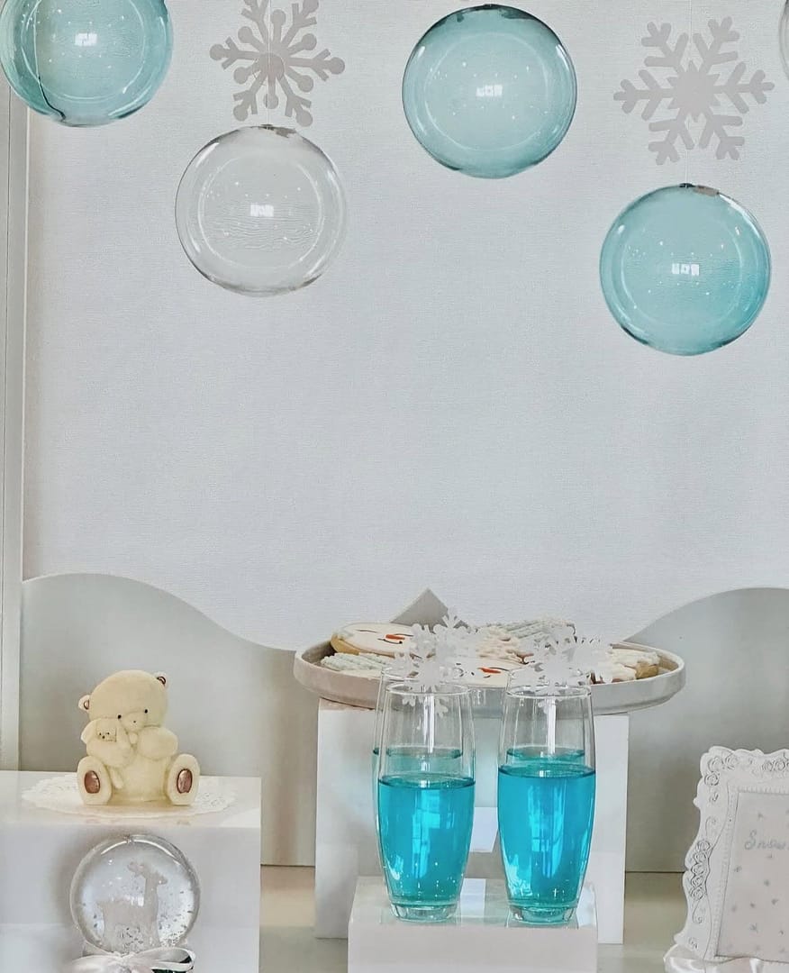 Baby Shower backdrop with snow flakes and blue drinks by mellow Events